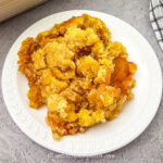 Close up of easy apple cobbler on a white plate