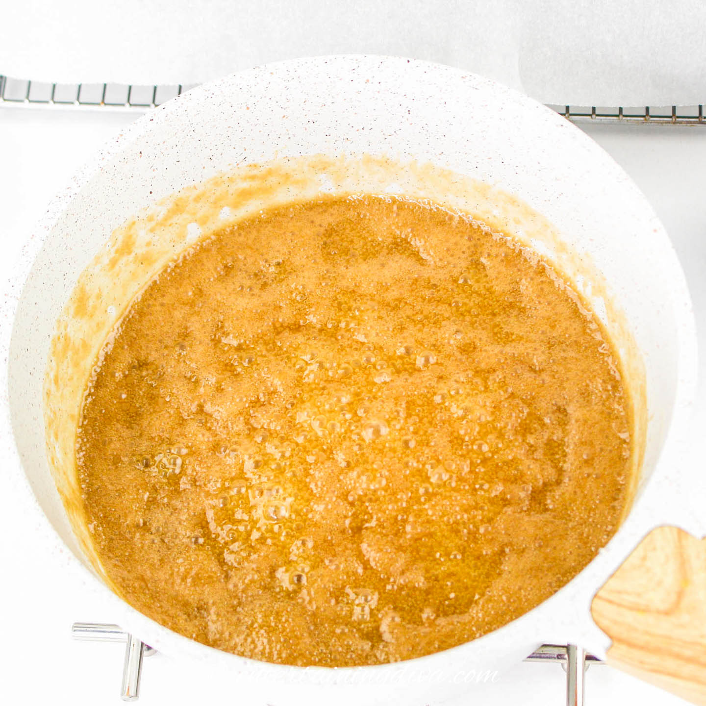 caramel sauce boiling on the stove