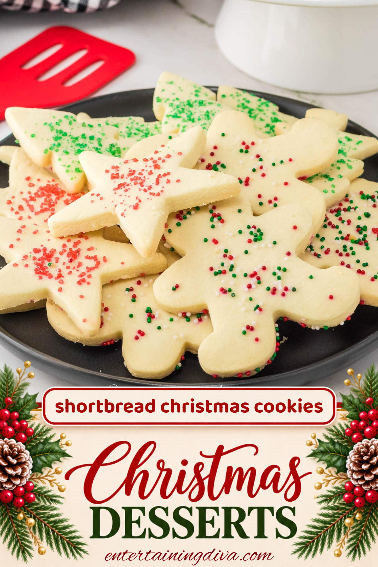 A plate of shortbread Christmas cutout cookies with sprinkles