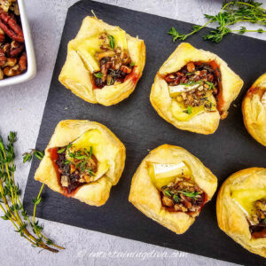 overhead view of 4 cranberry brie bites on a tray