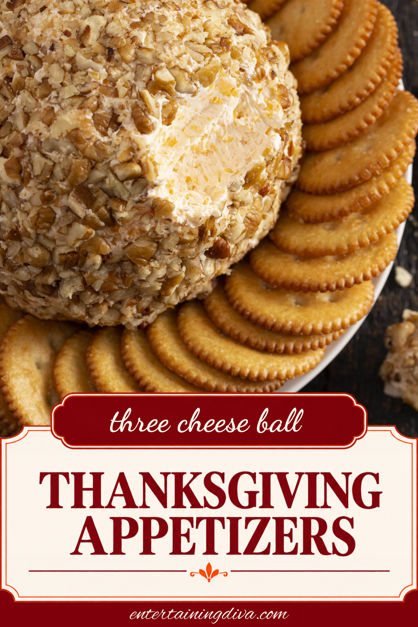 Super bowl party appetizer - Three cheese ball with crackers on a plate