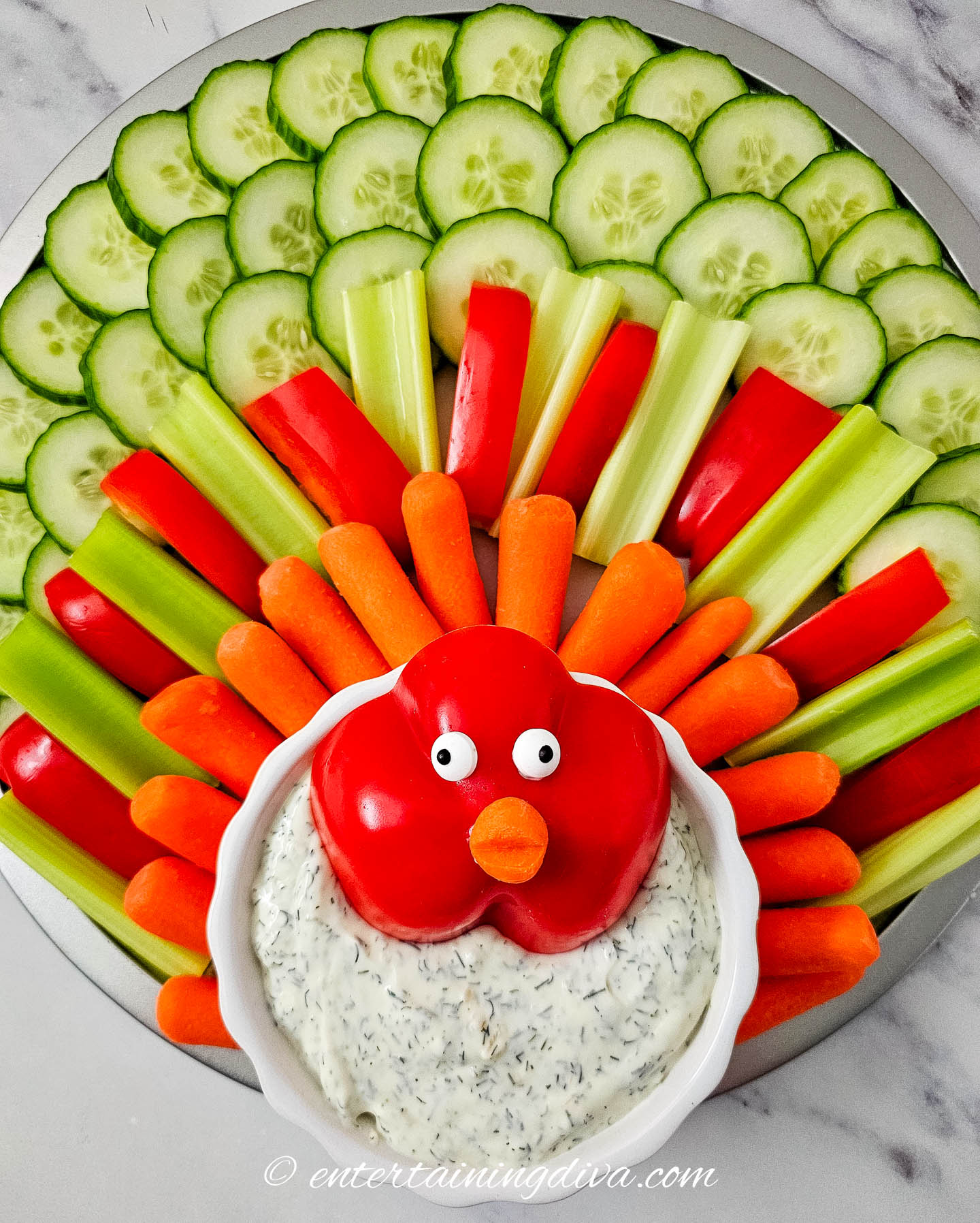 overhead of a turkey veggie tray with veggie dip