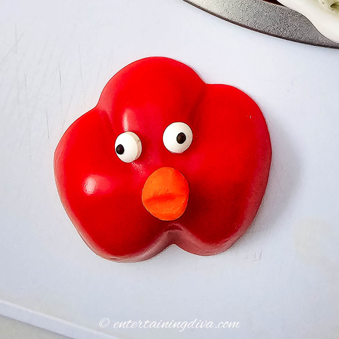 The turkey face made from a red pepper